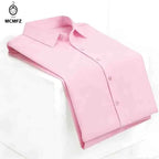Men's Smooth Short-Sleeve Stretch Shirt. Pointed collar and button front.