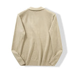 Men's Collared Zip-Neck Knit Polo. Fold-over polo collar.