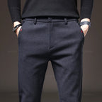 Men's Textured Smart Stretch Trousers. Polyester blend with viscose, nylon, cotton and elastane.