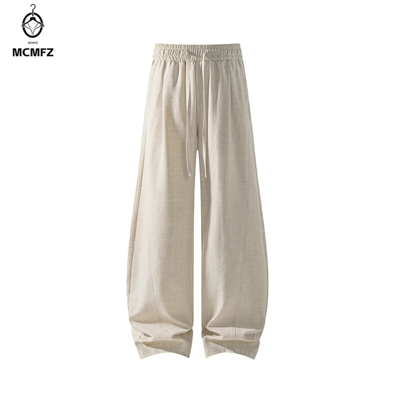Men's Linen-Look Textured Wide-Leg Trousers. Polyester fabric with a linen-look texture.