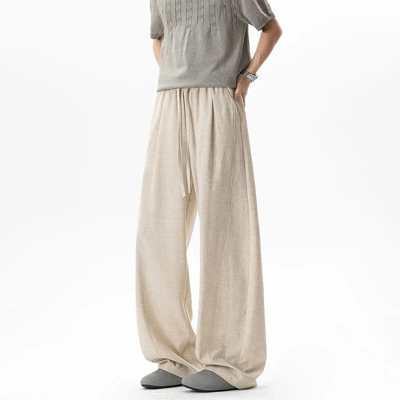 Men's Linen-Look Textured Wide-Leg Trousers. Polyester fabric with a linen-look texture.