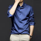 Men's Smooth Cotton-Blend Poplin Shirt. Cotton, rayon and polyester blend poplin.