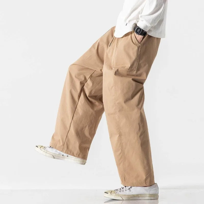 Men's Relaxed Wide-Leg Drawstring Trousers. Wide-leg shape.
