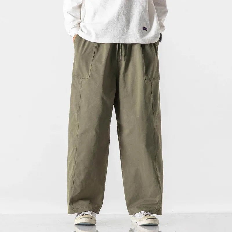 Men's Relaxed Wide-Leg Drawstring Trousers. Wide-leg shape.