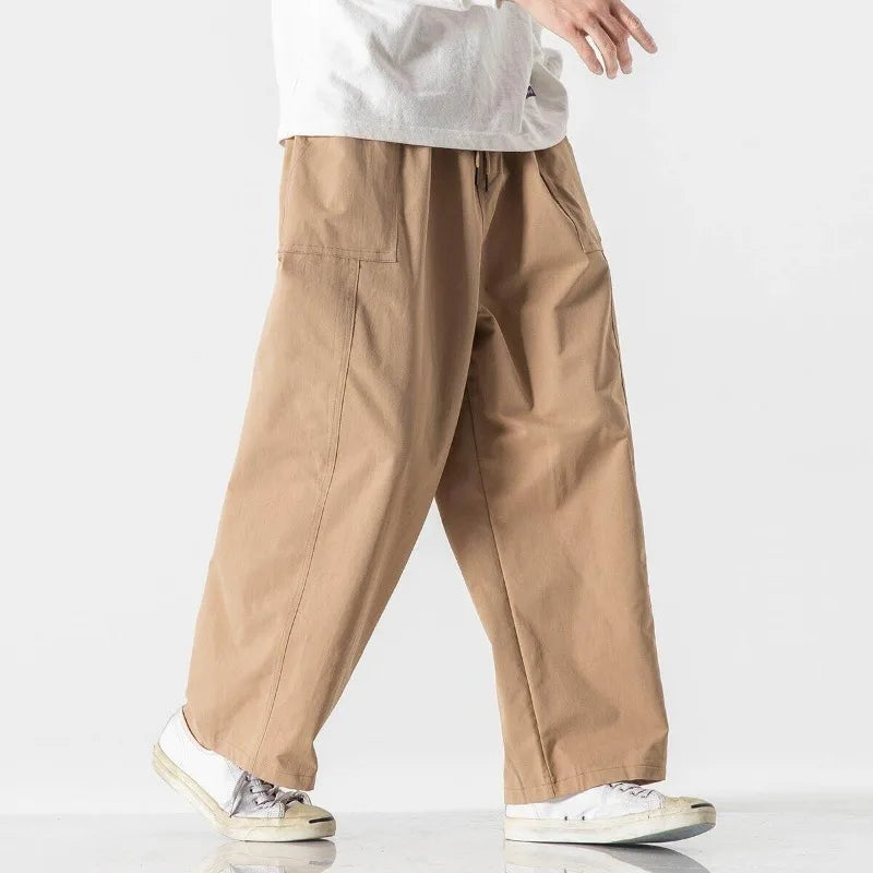 Men's Relaxed Wide-Leg Drawstring Trousers. Wide-leg shape.