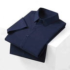 Men's Smooth Short-Sleeve Stretch Shirt. Pointed collar and button front.