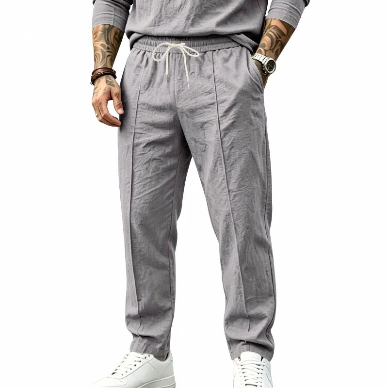 Men's Textured Tapered Drawstring Trousers. Textured finish.