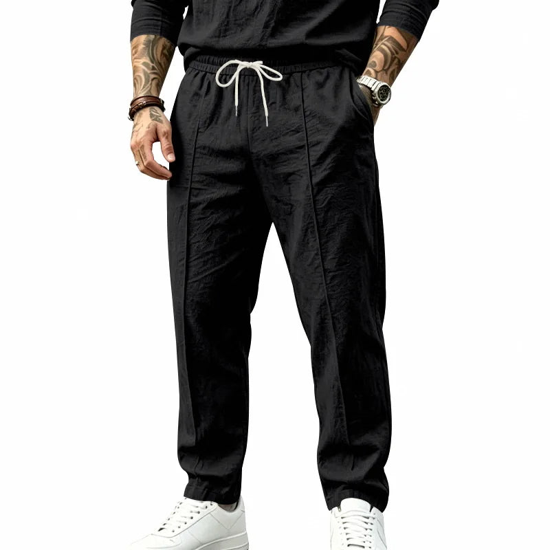 Men's Textured Tapered Drawstring Trousers. Textured finish.