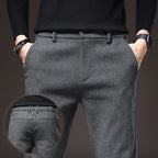 Men's Textured Smart Stretch Trousers. Polyester blend with viscose, nylon, cotton and elastane.