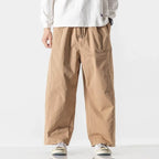 Men's Relaxed Wide-Leg Drawstring Trousers. Wide-leg shape.