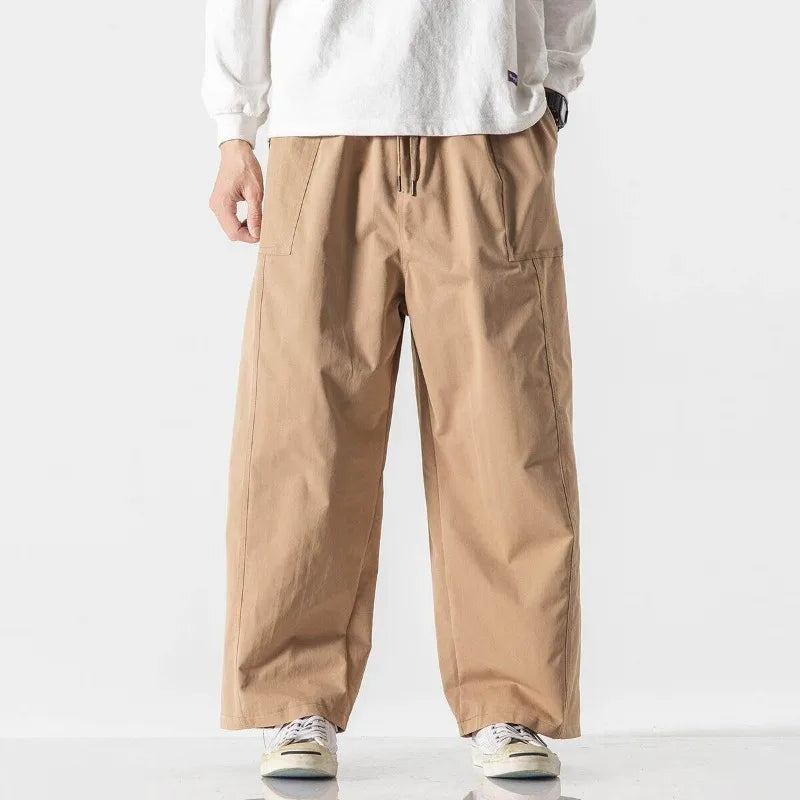 Men's Relaxed Wide-Leg Drawstring Trousers. Wide-leg shape.