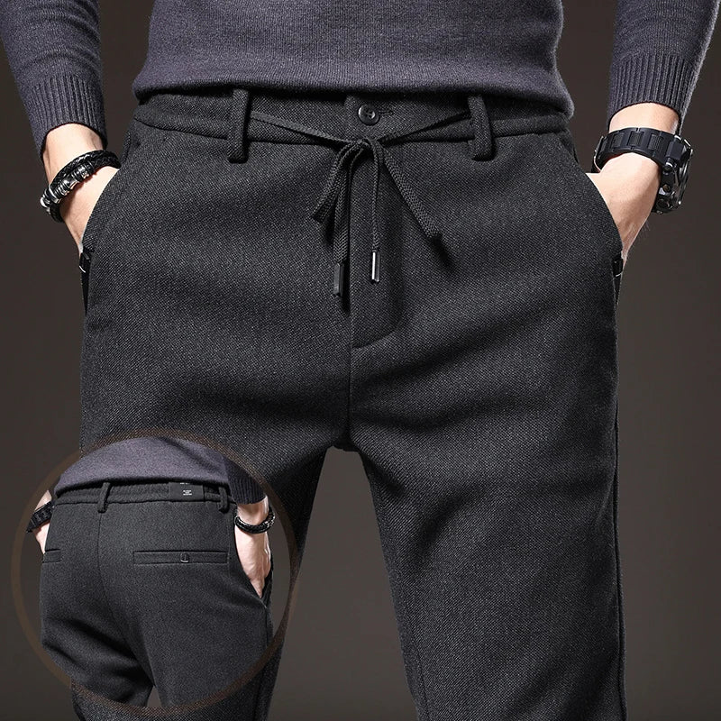 Men's Textured Smart Stretch Trousers. Polyester blend with viscose, nylon, cotton and elastane.