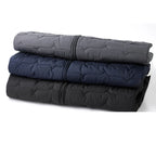 Men's Wave-Quilted Collarless Gilet. Wave quilt pattern.