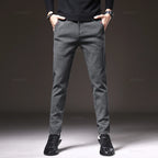 Men's Textured Smart Stretch Trousers. Polyester blend with viscose, nylon, cotton and elastane.