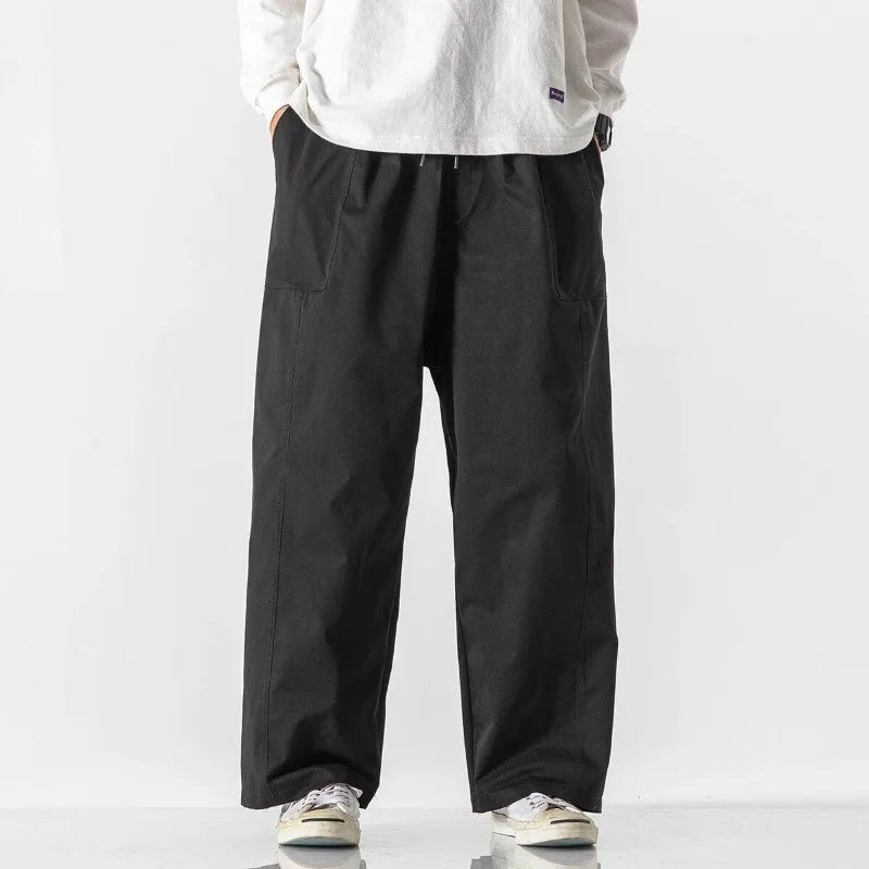 Men's Relaxed Wide-Leg Drawstring Trousers. Wide-leg shape.