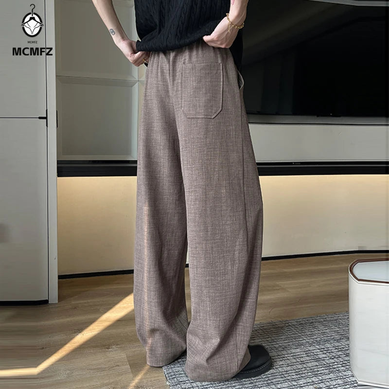 Men's Linen-Look Textured Wide-Leg Trousers. Polyester fabric with a linen-look texture.