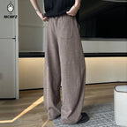 Men's Linen-Look Textured Wide-Leg Trousers. Polyester fabric with a linen-look texture.