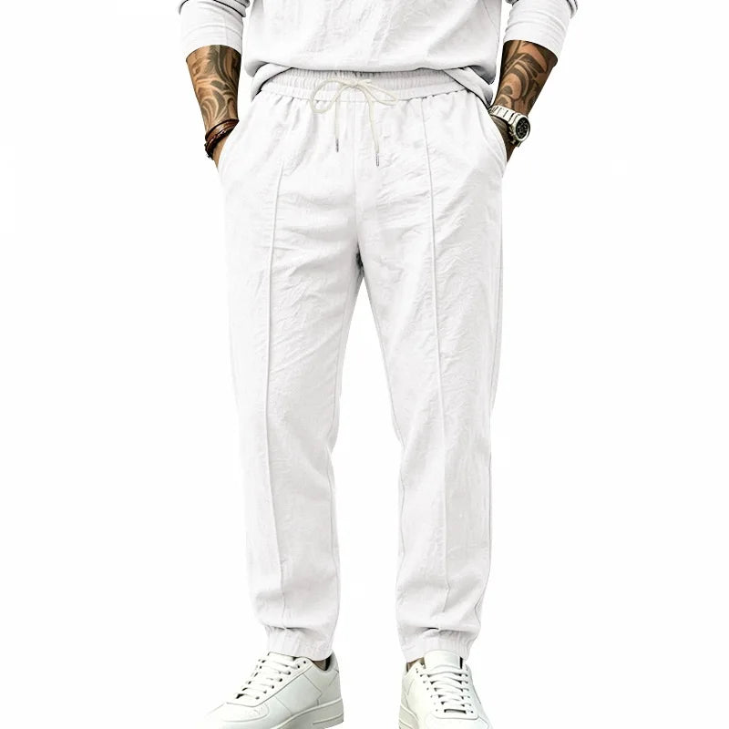 Men's Textured Tapered Drawstring Trousers. Textured finish.