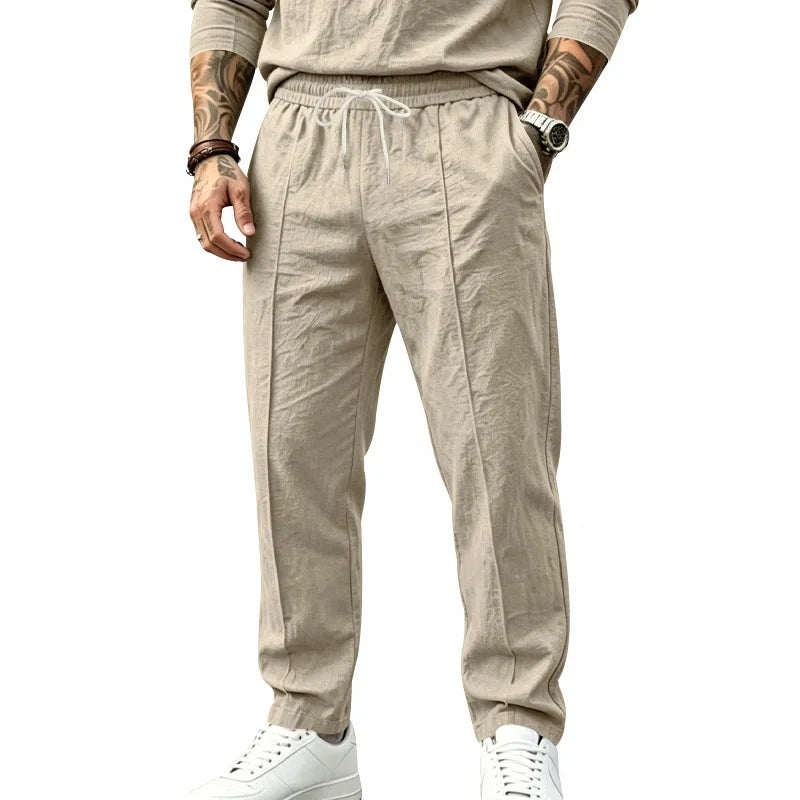 Men's Textured Tapered Drawstring Trousers. Textured finish.