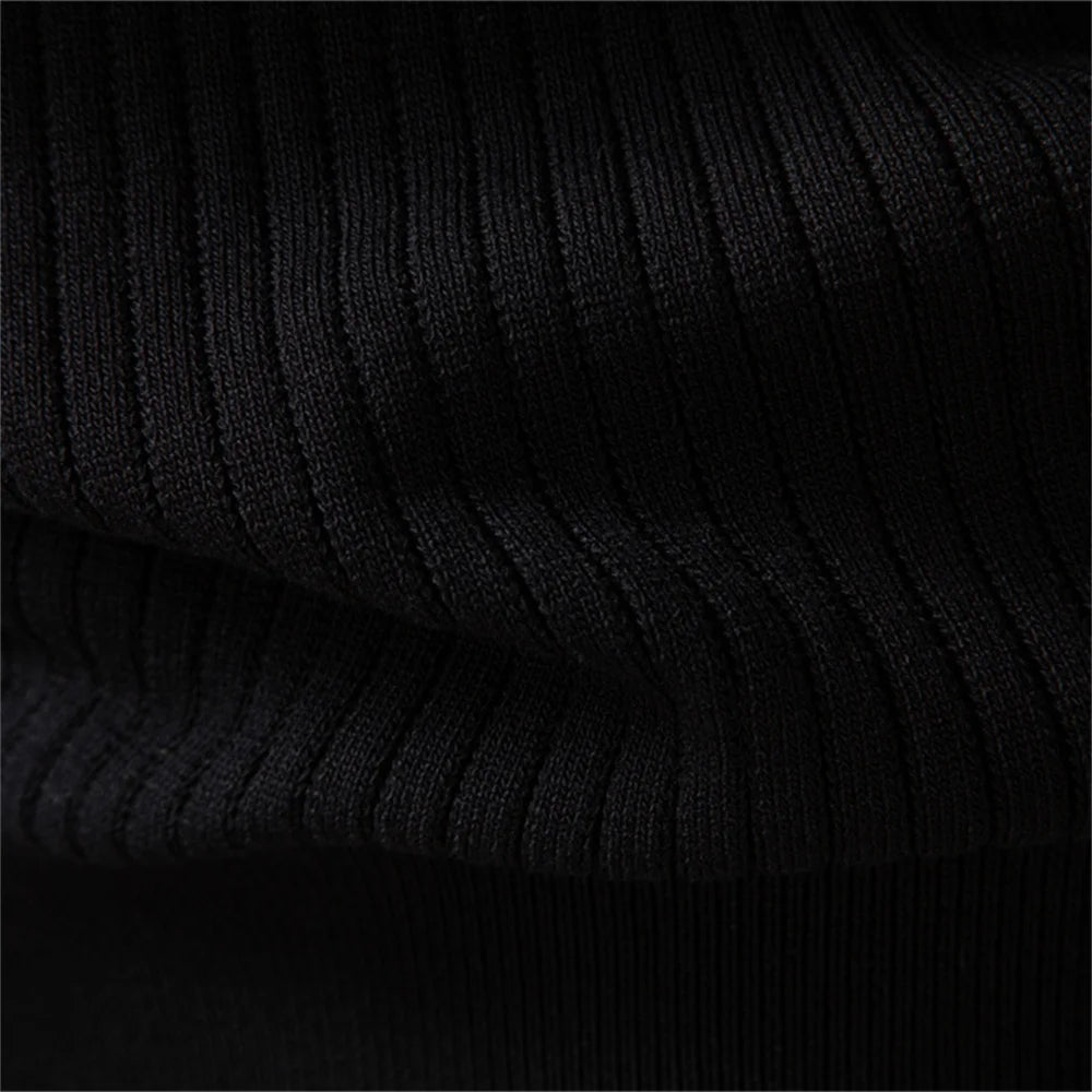 Men's Ribbed Three-Button Henley Knit. Henley neckline with three-button placket.