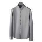 Men's Smooth Cotton-Blend Poplin Shirt. Cotton, rayon and polyester blend poplin.