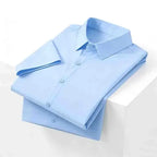 Men's Smooth Short-Sleeve Stretch Shirt. Pointed collar and button front.