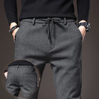 Men's Textured Smart Stretch Trousers. Polyester blend with viscose, nylon, cotton and elastane.
