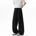 Men's Linen-Look Textured Wide-Leg Trousers. Polyester fabric with a linen-look texture.