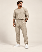 Textured drawstring trousers in Stone — model view