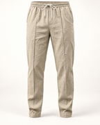 Textured drawstring trousers in Stone — studio view
