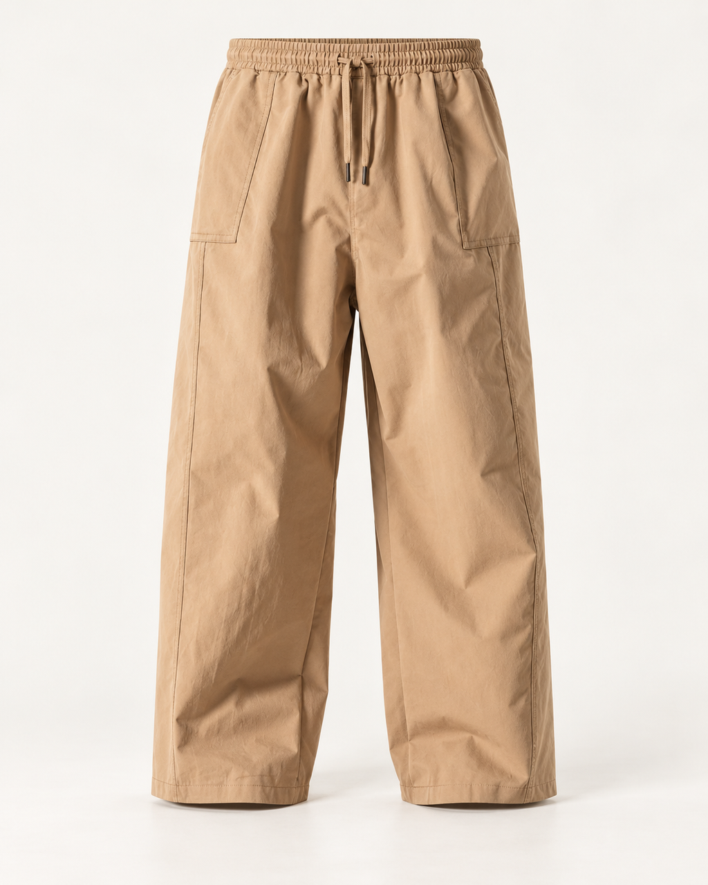 Relaxed wide-leg trousers in Stone — studio view