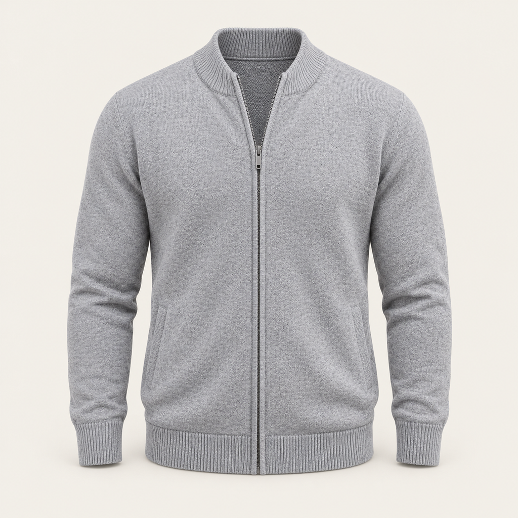 Studio view of knitwear on an ivory background