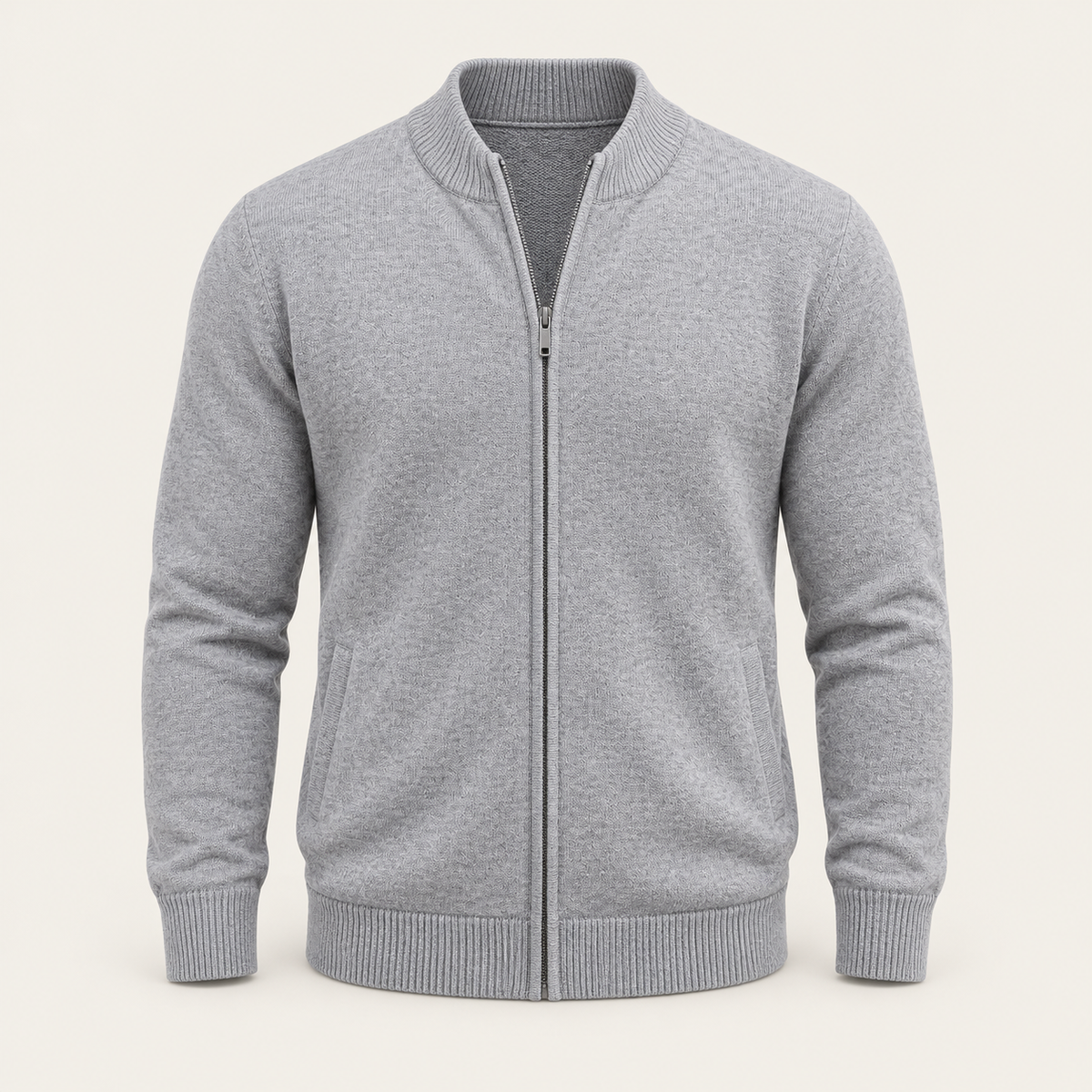 Studio view of knitwear on an ivory background