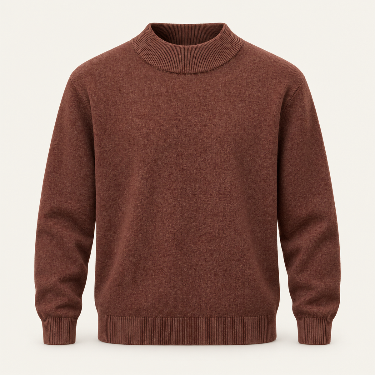 Studio view of knitwear on an ivory background