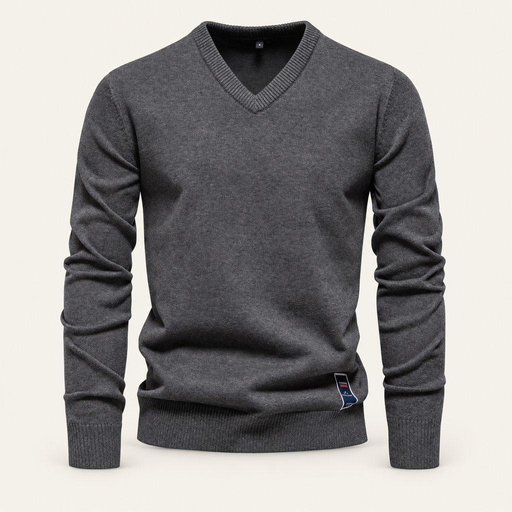 Studio view of knitwear on an ivory background