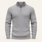 Studio view of knitwear on an ivory background
