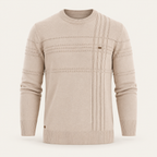 Studio view of knitwear on an ivory background