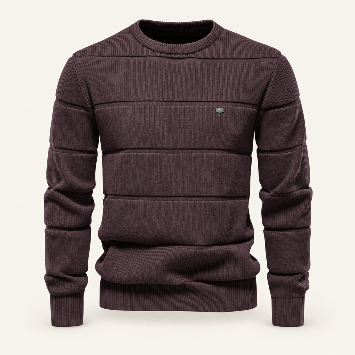 Studio view of knitwear on an ivory background