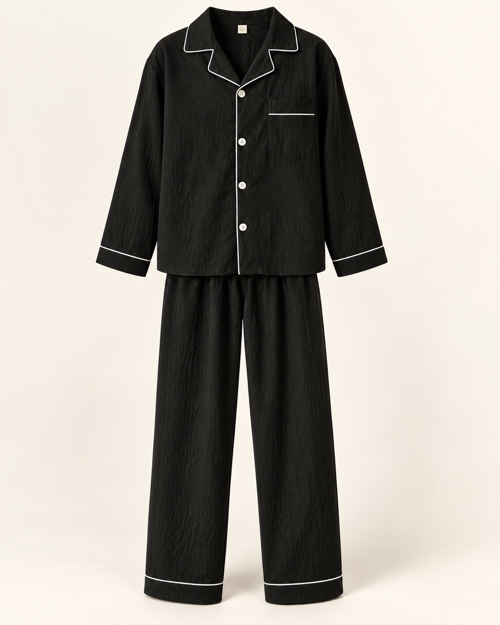 Textured piped pyjamas — studio view