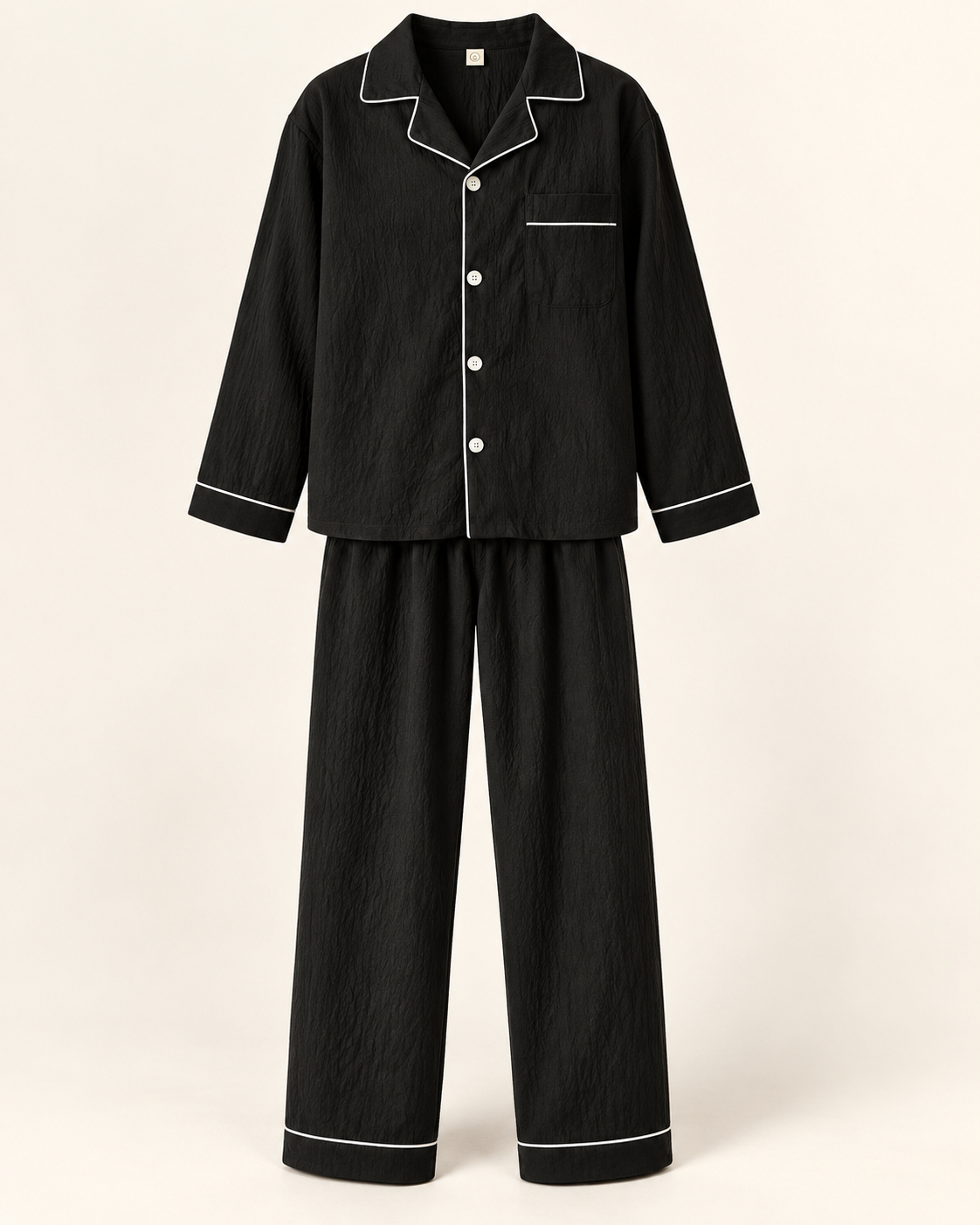 Textured piped pyjamas — studio view