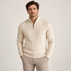 Model wearing the cream cable knit half zip sweater