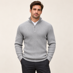 Model wearing knitwear in a neutral studio