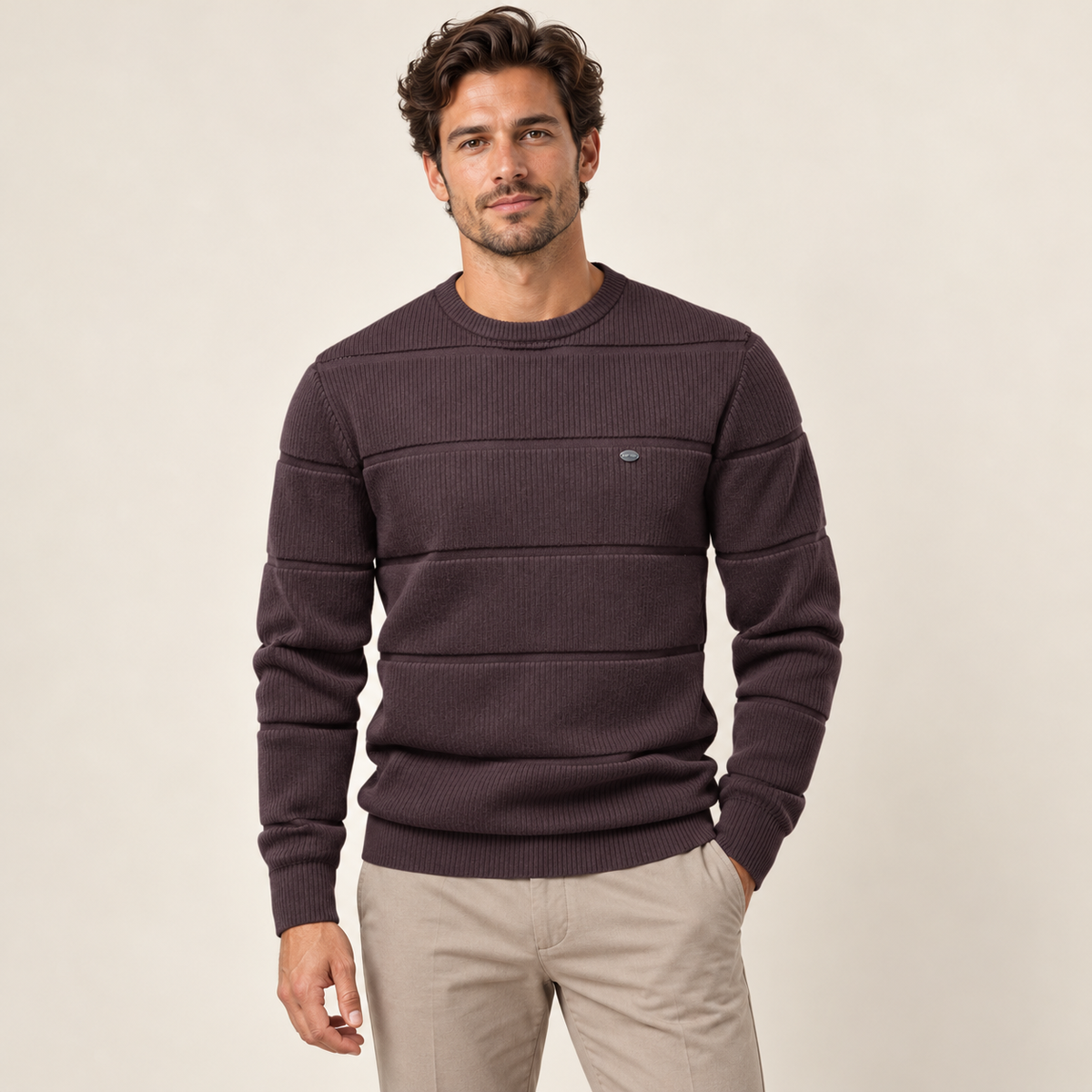 Model wearing knitwear in a neutral studio